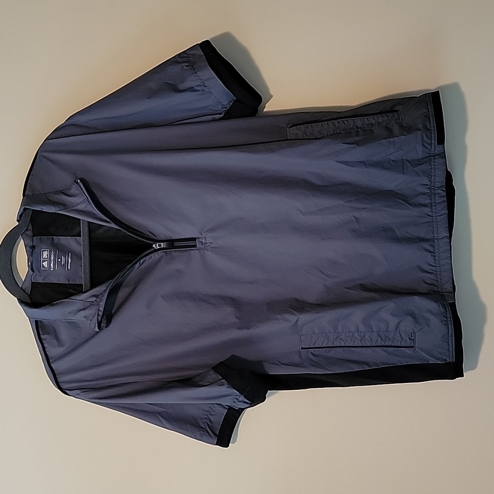 Men's Adidas ClimaProof short sleeved Golf Jacket.  Like New Size Medium.
